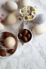 Fototapeta na wymiar Easter celebration with chocolate eggs for kids and babies 