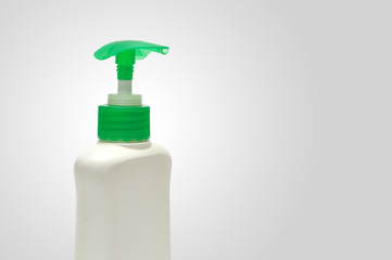 hand sanitizer bootle green color horizontal white background