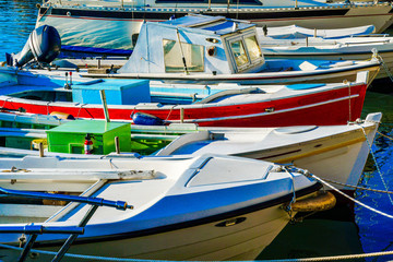 Fototapeta na wymiar Fishing boats in port of Evia in Greece