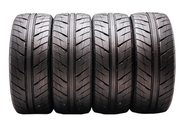 nice summer tires, four pieces set in a row. pour, white background