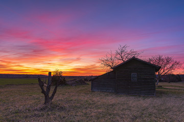 SUnset over a little barn