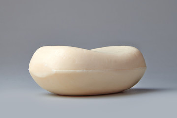 White soap bar on a gradient background