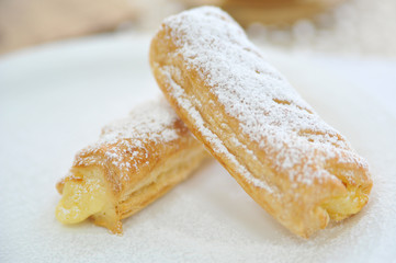 Puff with condensed milk. Coffee desserts. Delicious dessert with coffee.
