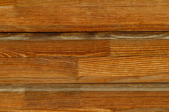 Creative wooden background with the technology of splicing dies of wood along the length. Flat lacquered wood background © Aleksandr Lesik
