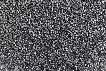 Polypropylene granule close-up background texture. plastic resin ( Masterbatch).Grey chemical...