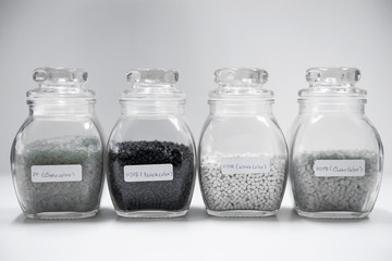 Polypropylene granule close-up background texture. plastic resin ( Masterbatch).Grey chemical...