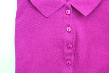 Purple polo shirt casual clothing close up top view. Buttoned colorful collar neck t-shirt, light violet fashion clothes detail