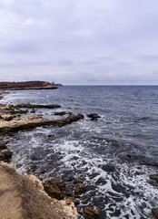 Fototapeta na wymiar sea shore made of rocks and large stones