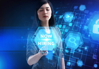 Business, Technology, Internet and network concept. Young businessman working on a virtual screen of the future and sees the inscription: Now hiring