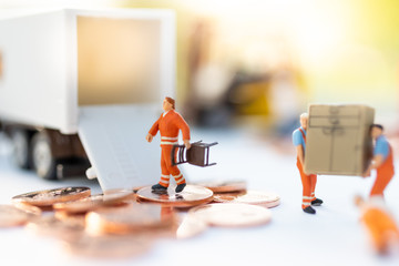 Miniature people : Worker move thing to destination place. Image use for logistic concept, shipment order from customer