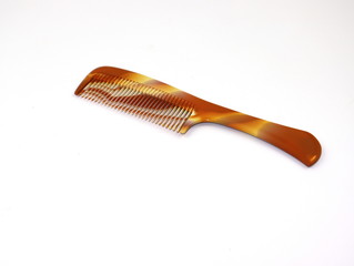 Plastic hair comb isolated in white background.