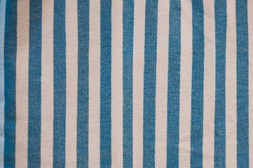 A beautiful and simple blue and white striped fabric made out of wool and cotton with a repeated...
