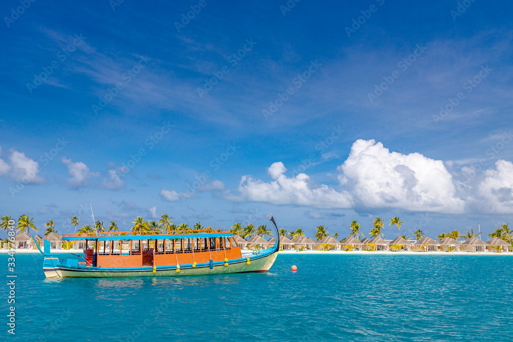 Canvas Prints exotic maldives beach landscape. maldives traditional boat dhoni and perfect blue sea with lagoon. l