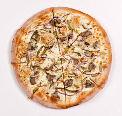 pizza cut into pieces. View from above