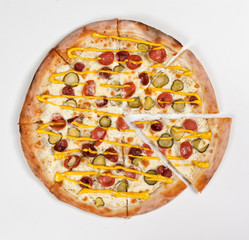 pizza cut into pieces. View from above