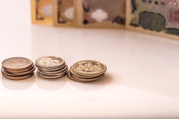 Japanese coins and banknotes and passport on white table
