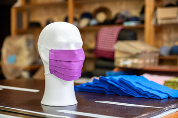 Cotton face mask in tailor's workshop