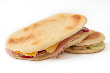 two sandwiches, isolated on white background. side view