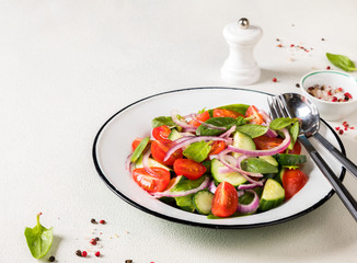 Green vegan salad from vegetables and  green leaves mix.