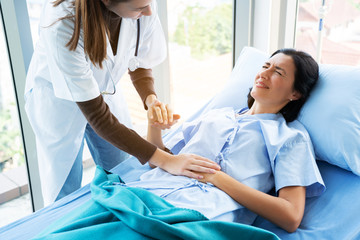 Doctor treatment patients in hospital room. Medical professionals help treat Sick people. Physical...