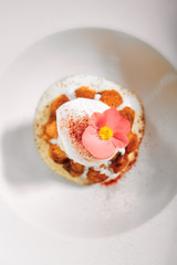 Rum baba with ice cream scoop