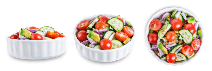 Cucumber tomato avocado red onion salad on a white isolated background