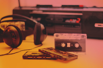 retro postcard or picture. audio cassettes on the background of the player. Retro style and...