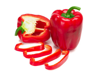 Red sweet pepper its half and pieces isolated on white background