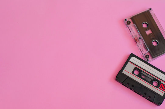 retro background or banner. Cassettes on a multi-colored pink background. Blank with space for text