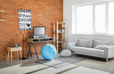 Fitness ball near workplace at home