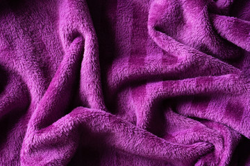 Fototapeta na wymiar Texture purple velvet fabric close up