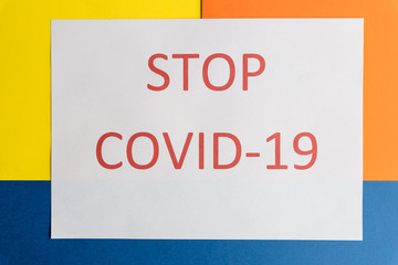 text Stop Coronavirus , covid-19 on colorful background.message as advertisement. Healthcare and medical concept. Top view. Quarantine concept.