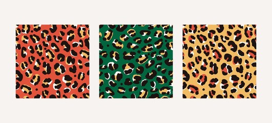 Set of three various leopard windy prints in trendy colors. Hand-drawn seamless vector patterns. © Sinichka
