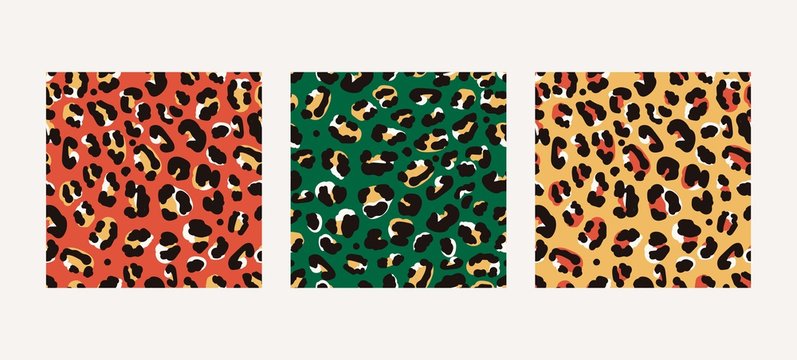 Set of three various leopard windy prints in trendy colors. Hand-drawn seamless vector patterns.