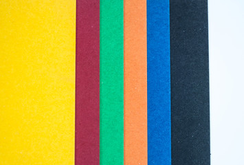 Sheets of colored paper on white background