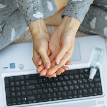 Hands Desinfection After Working At The Computer. Rules Of Conduct Due To The Quarantine.