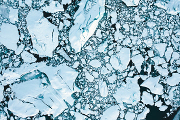 Overhead Aerial Shot of Ice Floes in Beautiful Blue Color shot in Iceland