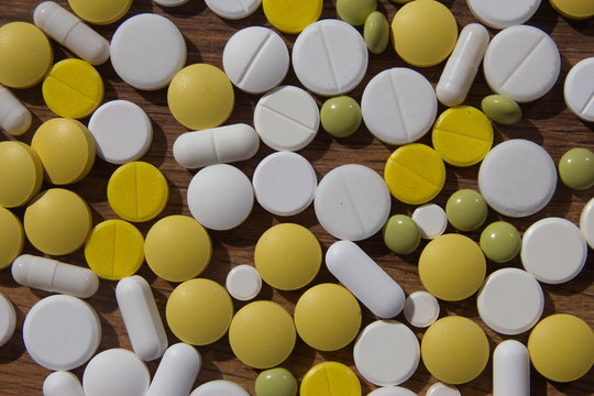 tablet meditsyna, different types of pills for health, texture photo for advertising and text © Viktoriya