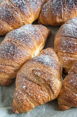 Cooked homemade croissants with copy space