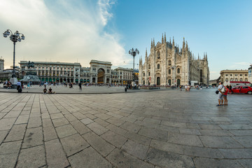 MILAN, ITALY - AUGUST 1, 2019 : The piazza, looking roughly north-east to the Duomo - on the right,...