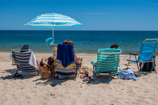 Relaxing on the beach at Tavira Island or Ilha de Tavira, Eastern Algave, Portugal
