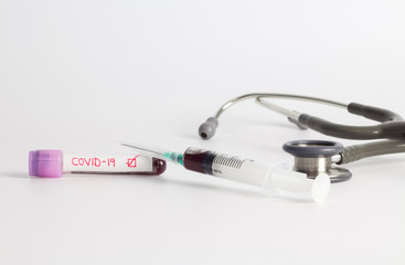 Positive result Coronavirus(Covid-19) blood sample vacuum tube and injection syringe with...