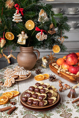 Christmas cookies filled with marmalade and dipped in chocolate