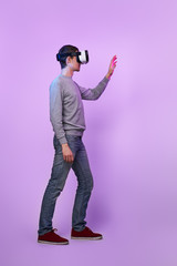Naklejka premium Man is using virtual reality headset.