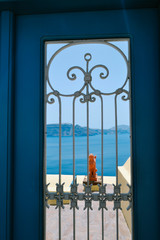 Sea Against Sky Seen Through Beautiful Blue Door, Santorini, Greece