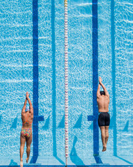 Two Swimmers Diving