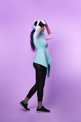 Woman wearing virtual reality headset.