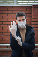 male guy medical mask gloves coronovirus covid-19 health safety