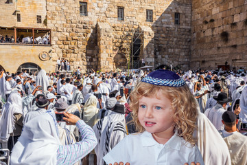 Jewish boy with blue eyes in a yarmulke