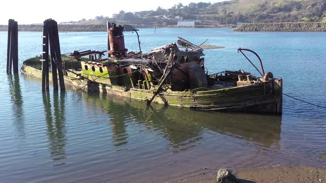 A steamer build in 1881 in Gold Beach now resting in peace in the Rouge River where it sank in 1985 now an important piece of culture and history and a valuable landmark in Gold Beach, Oregon 
